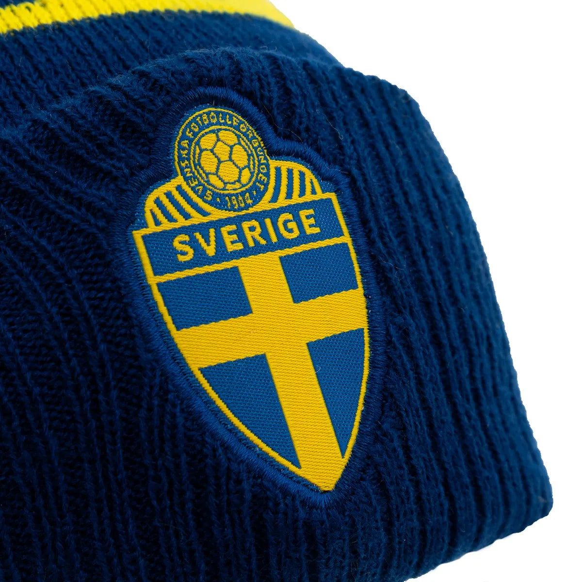Stickad mössa marinblå/gul