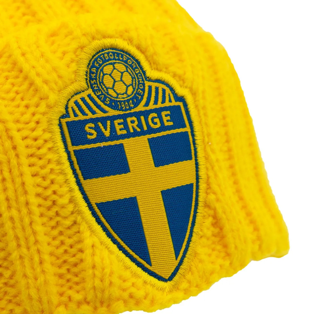 Stickad mössa med uppvik gul